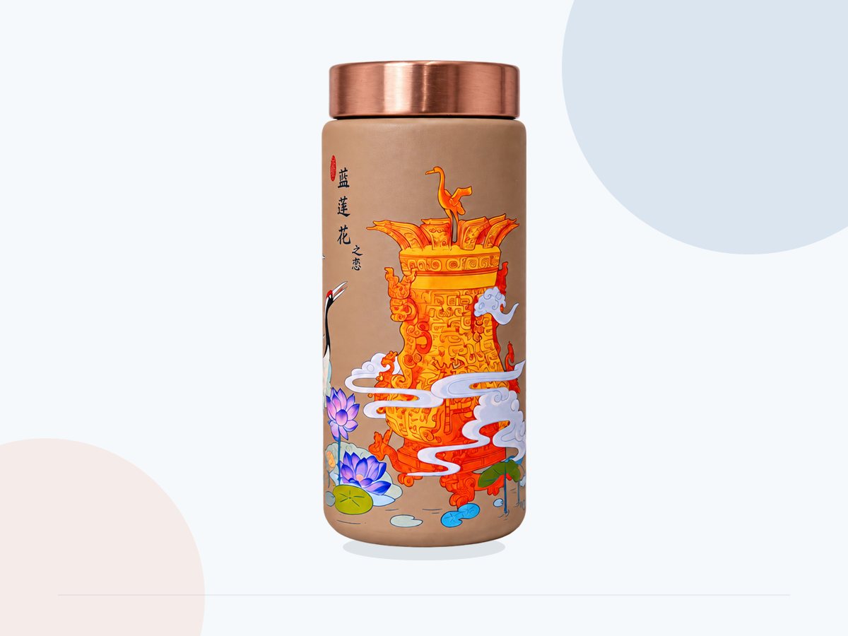 Full view of a colorful print on a cylindrical bottle