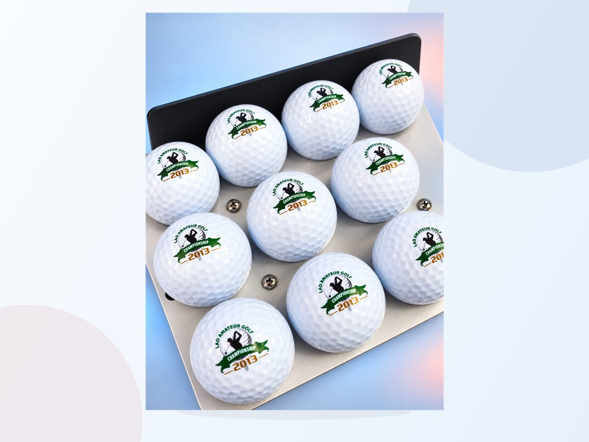 Full view of custom golf balls on the printing platform